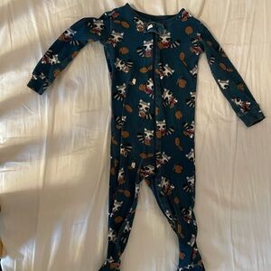 The children’s place footie pajamas: raccoon eating cookies